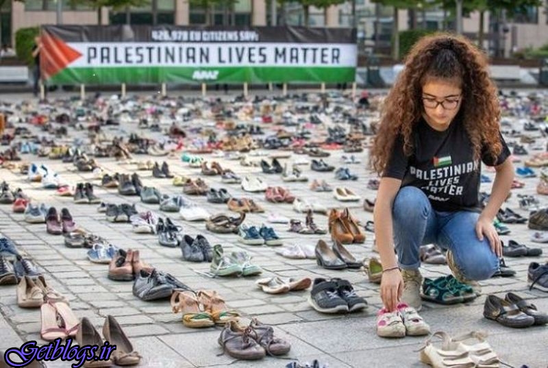 عکس) + هزاران جفت کفش برابر مقر اتحادیه اروپا چیده شد (
